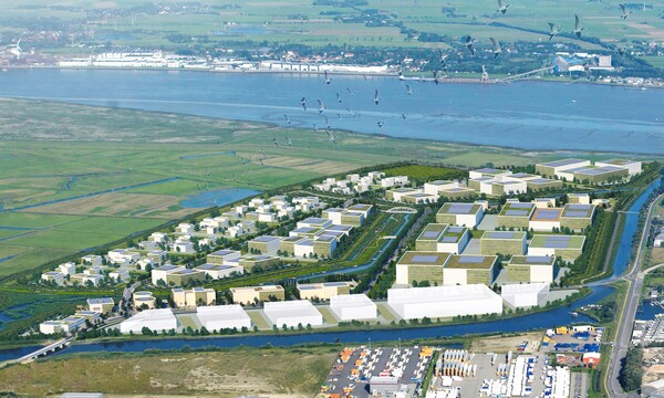 Das LUNEDELTA mit Blick Richtung Nordsee | © BIS/urbanegestalt PartGmbB Luftbild eines Gewerbegbiets mit Gebäuden und Wasser im Hintergrund | © BIS/urbanegestalt PartGmbB